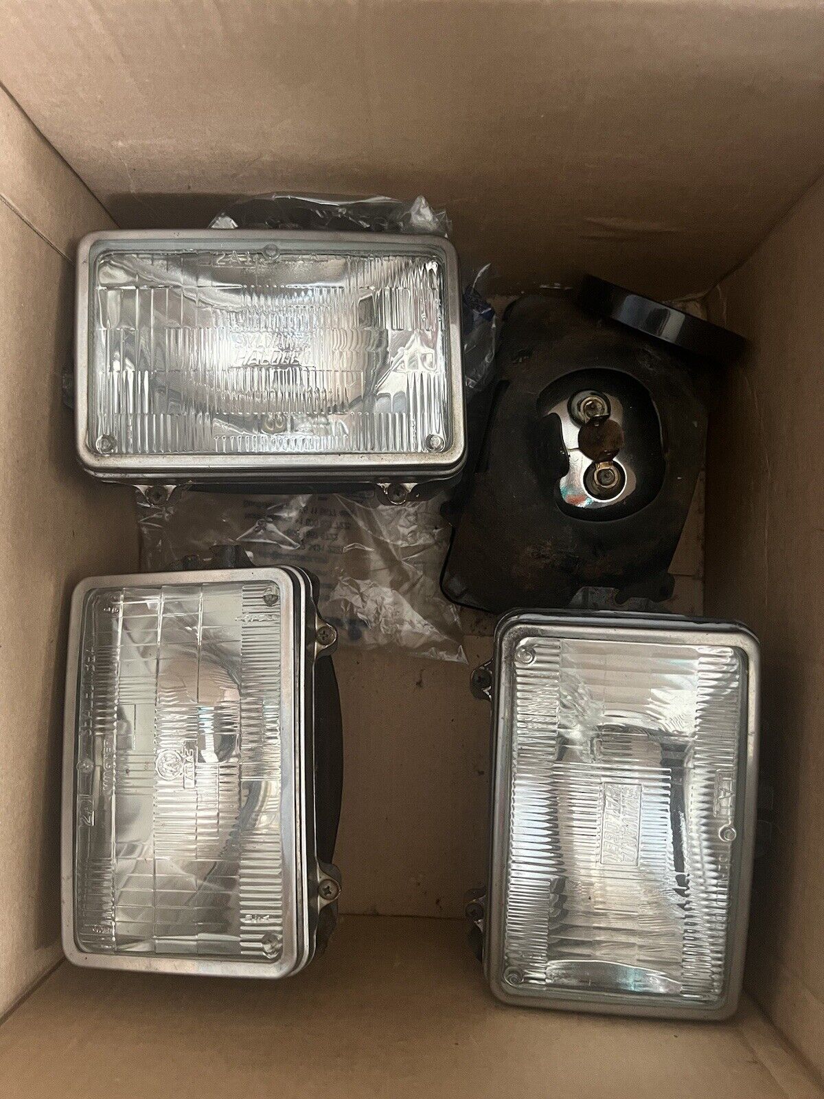 Set Of High Low OEM G body Sylvania Glass Headlights And Buckets/trim